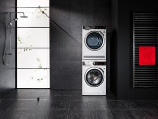 tumble dryer on top of washing machine