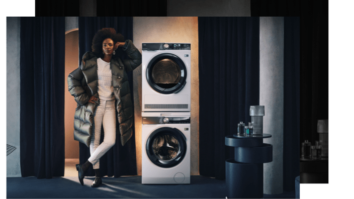 Woman standing beside WM and TD