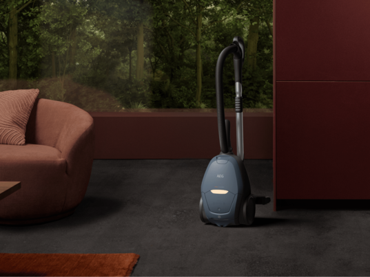 Corded vacuum on floor